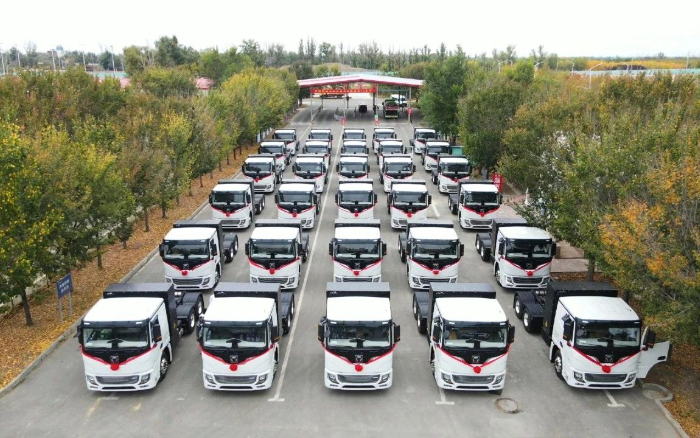 脱碳“换”绿举行时！俄罗斯专享会新能源重卡批量交付西北